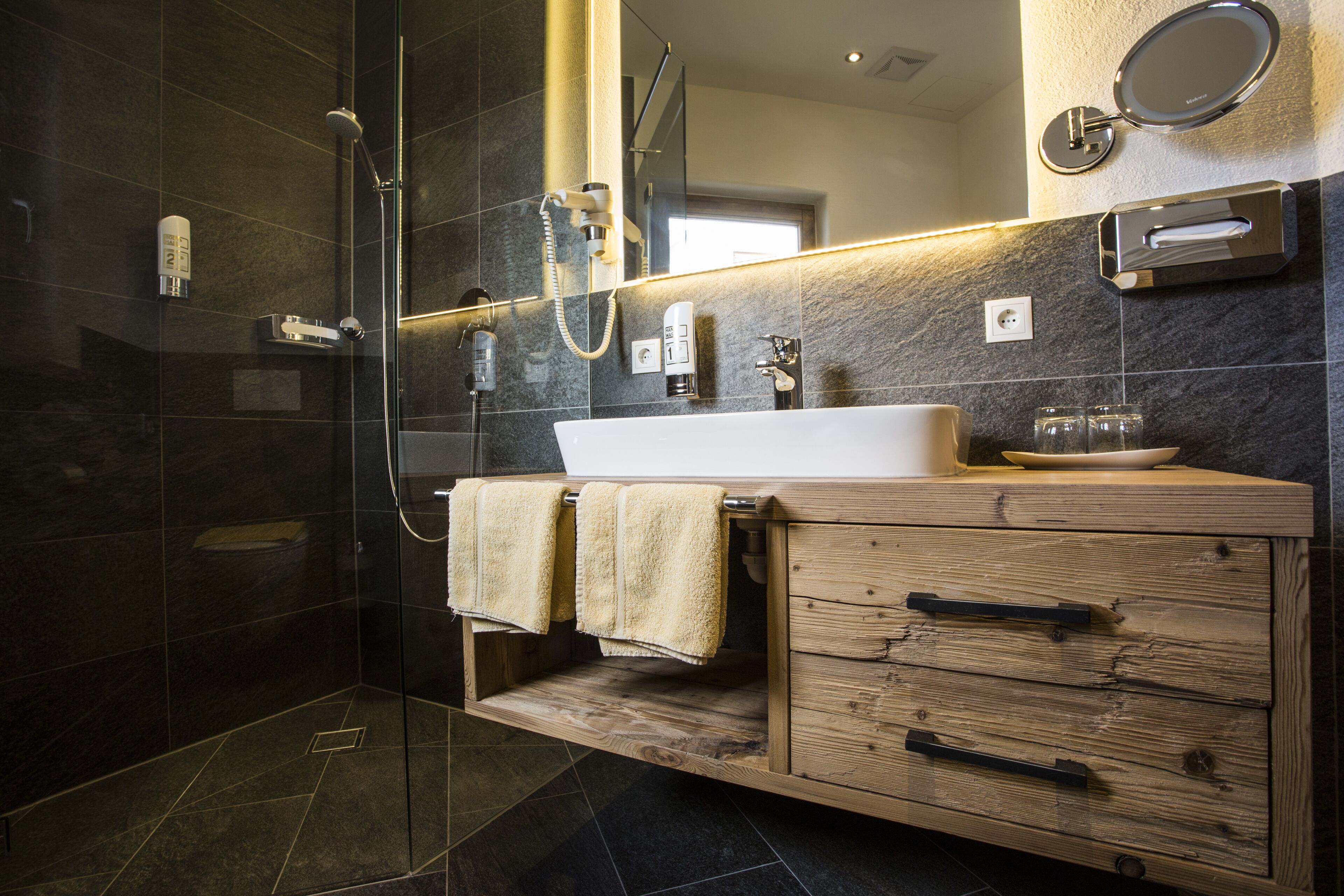 shower, hair dryer, bathrobes, slippers