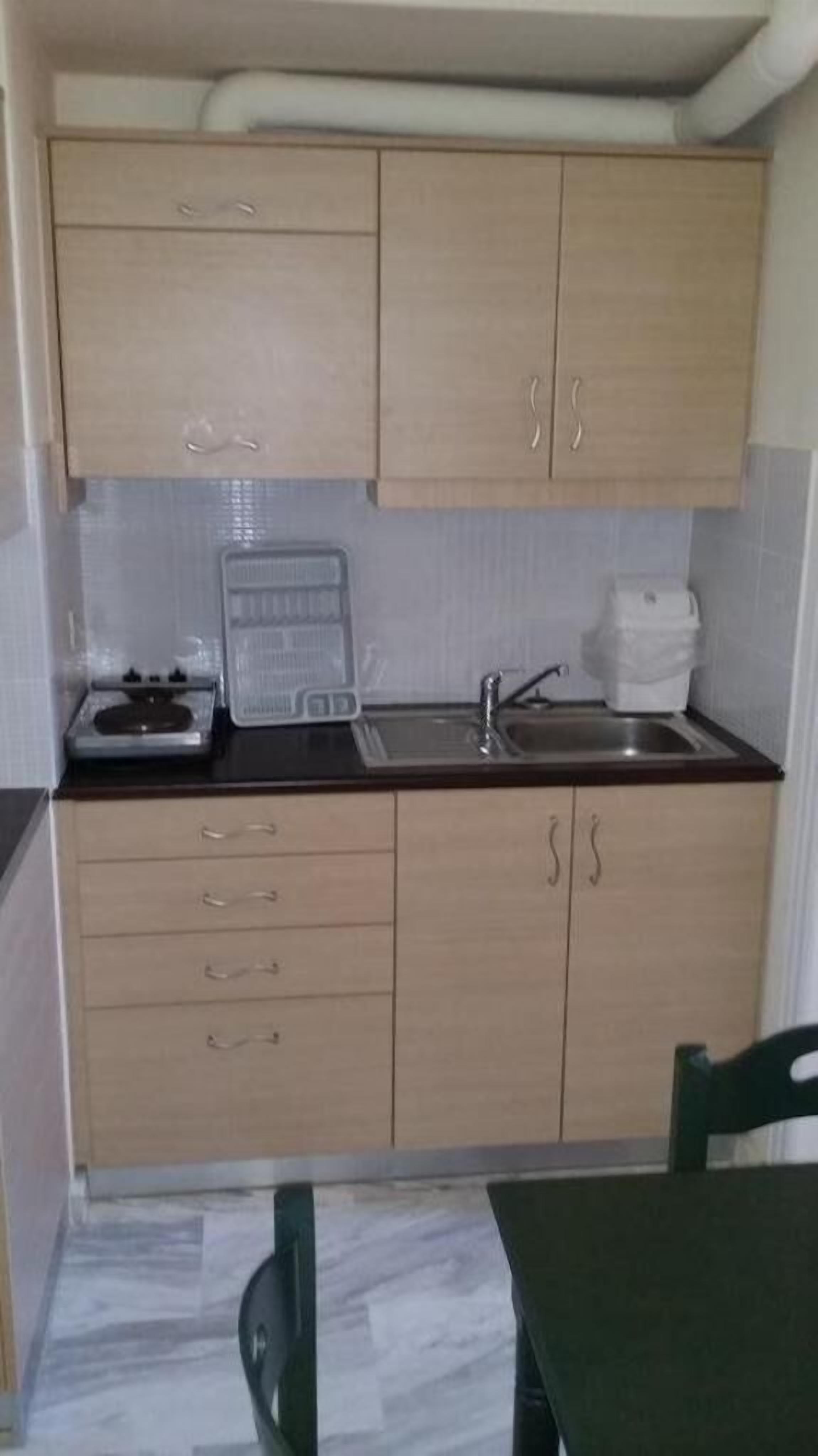 studio for 3 adults | private kitchenette | full-sized fridge, microwave, stovetop, coffee/tea maker