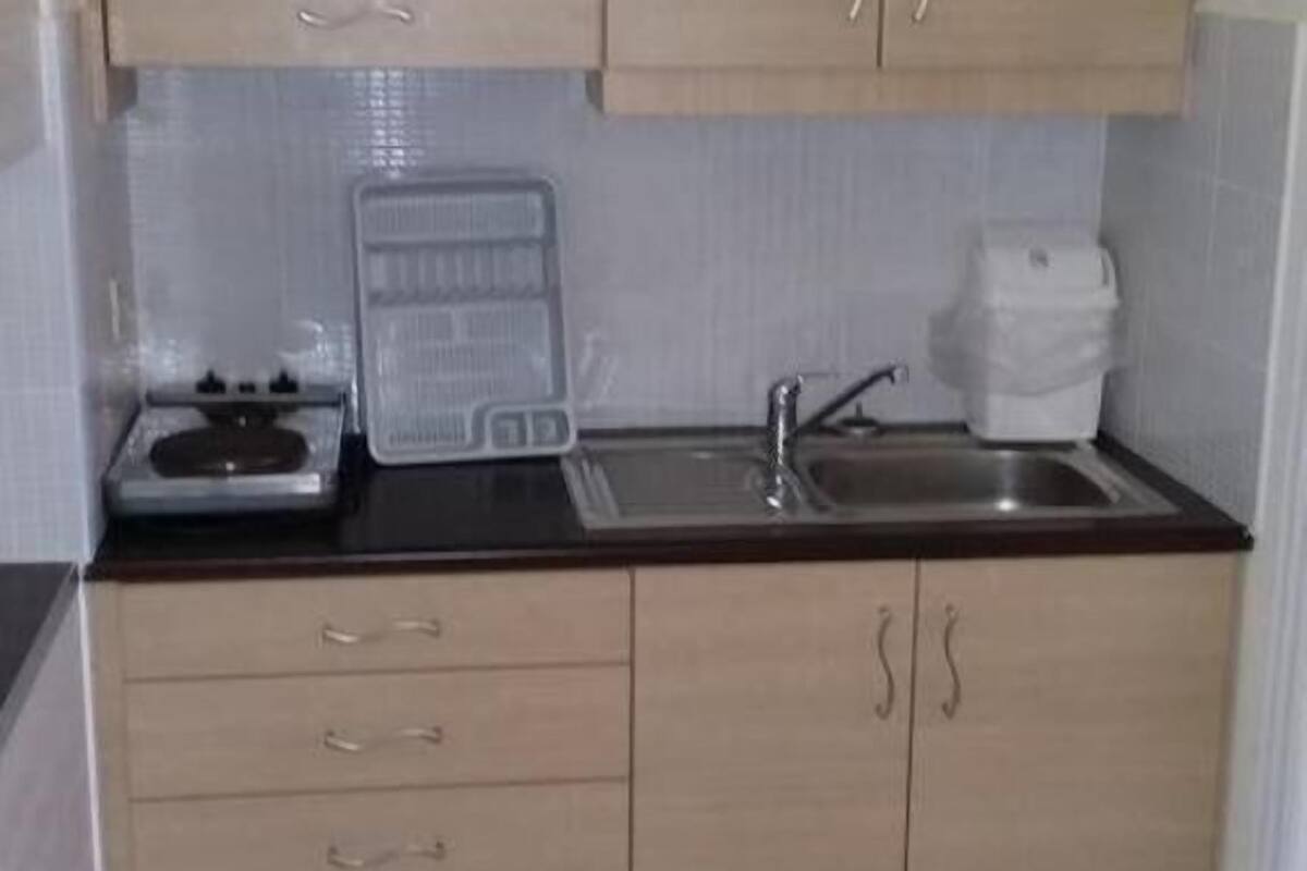 studio for 3 adults | private kitchenette | full-sized fridge, microwave, stovetop, coffee/tea maker