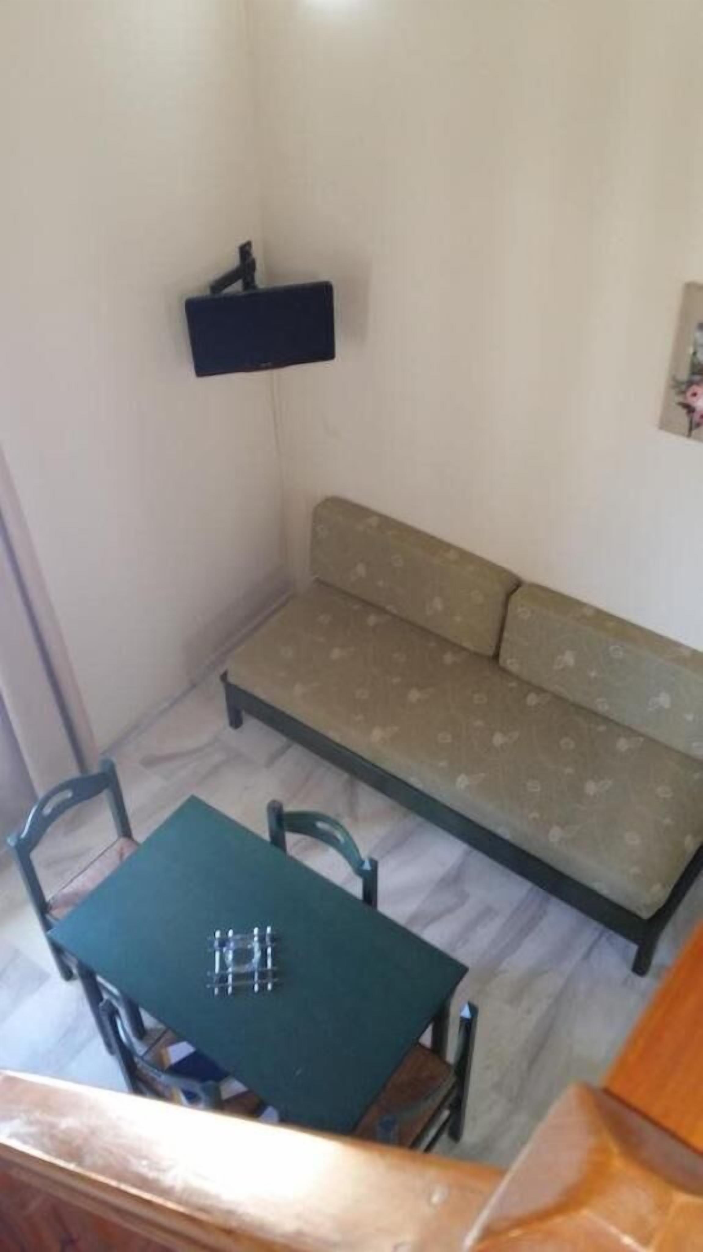 duplex | living area | 17-inch flat-screen tv with satellite channels, tv