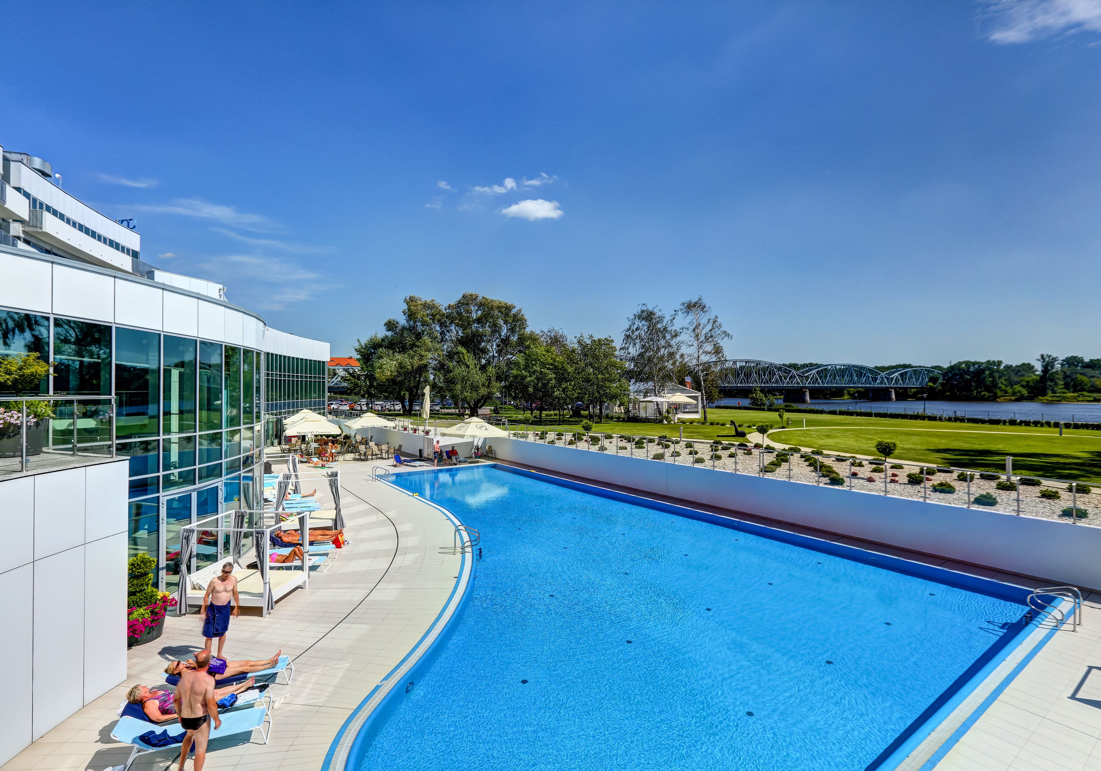 Indoor pool, outdoor pool, pool umbrellas, sun loungers
