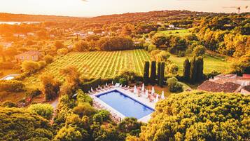 Seasonal outdoor pool, pool umbrellas, pool loungers