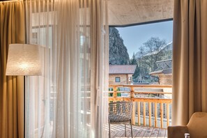 Suite superior, balcón (Alpinsuite) | 1 dormitorio, minibar, caja fuerte y escritorio