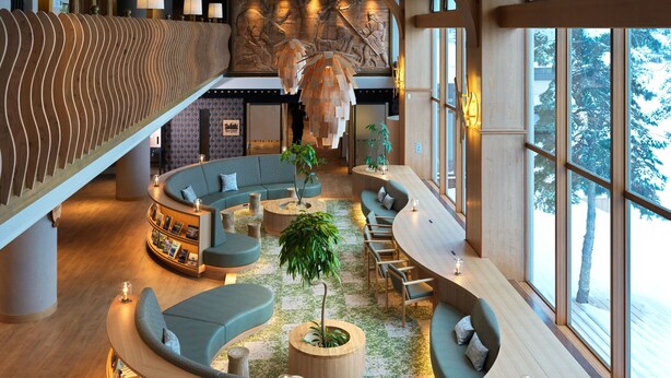A modern interior with a curved seating area, a central plant, and a wooden bookshelf with books.