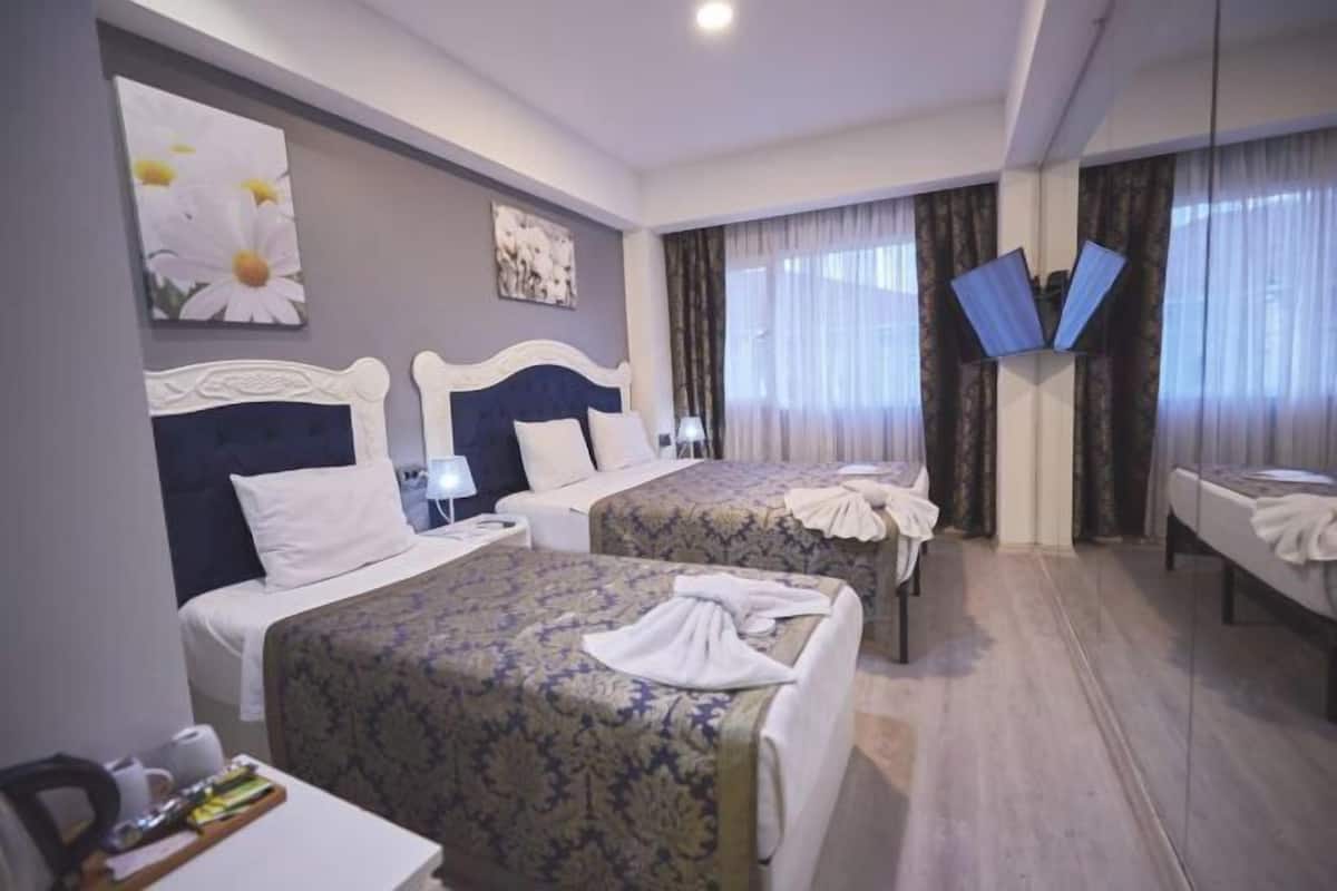 Ropa de cama de alta calidad, minibar, caja fuerte