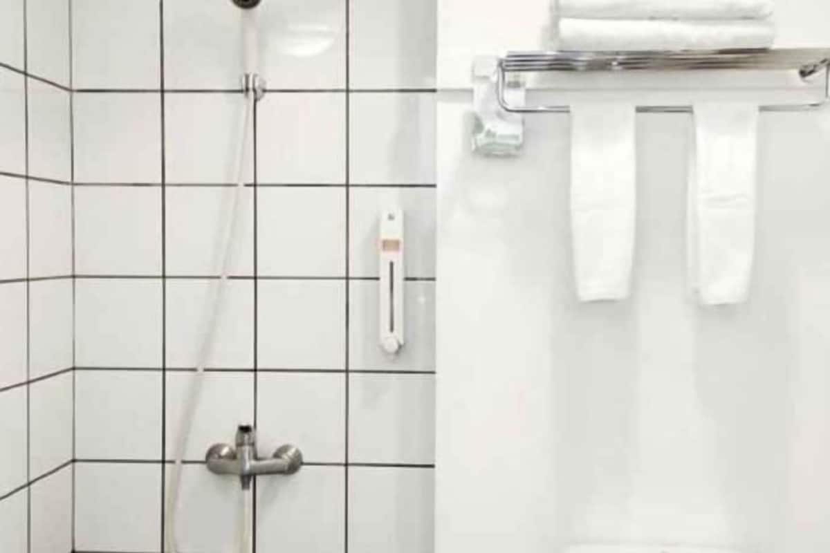 Bathroom | Shower, free toiletries, hair dryer, slippers