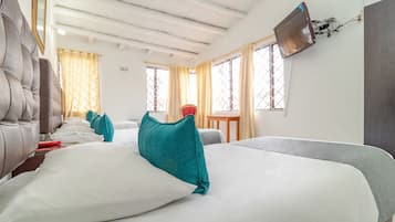 Triple Room | Individually furnished, blackout drapes, free WiFi, bed sheets