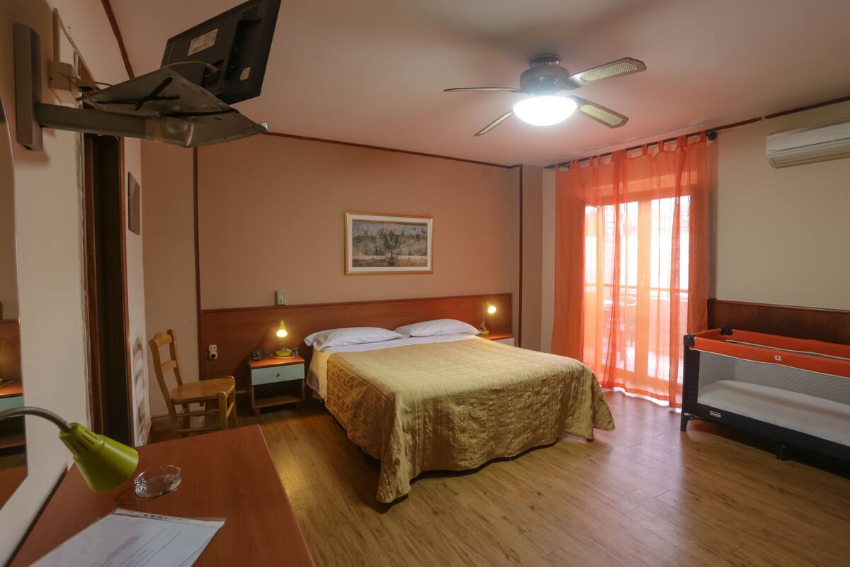 Economy Double Room, Ground Floor | Frette Italian sheets, Select Comfort beds, minibar, in-room safe