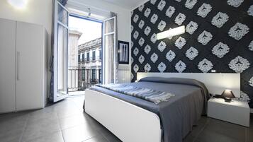 Quarto casal | Roupas de cama premium, escrivaninha, camas extras/dobráveis (sobretaxa)