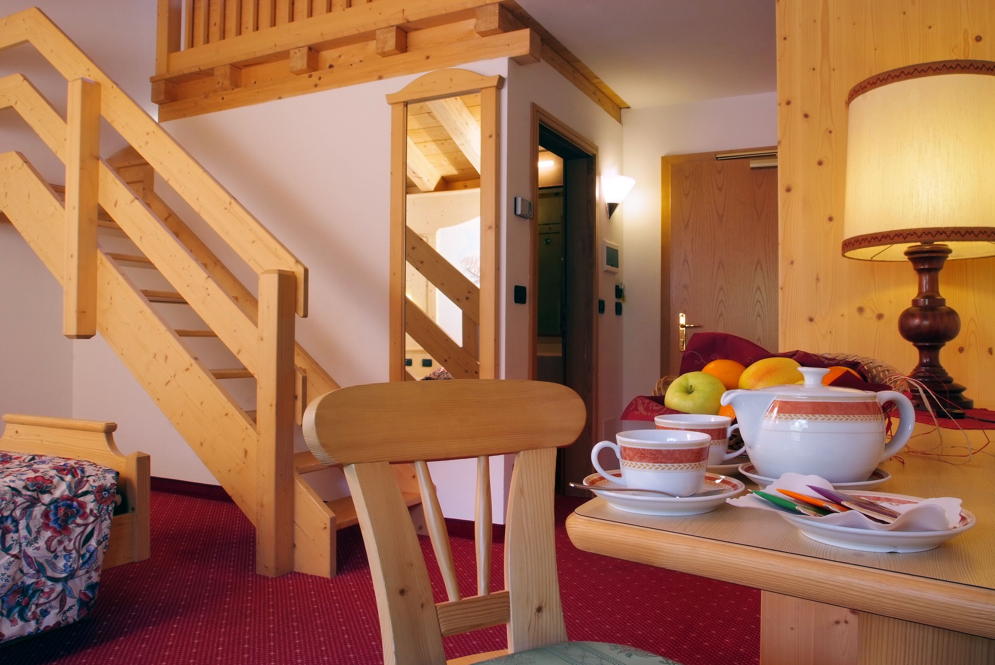 superior triple room | in-room safe, desk, laptop workspace, blackout curtains