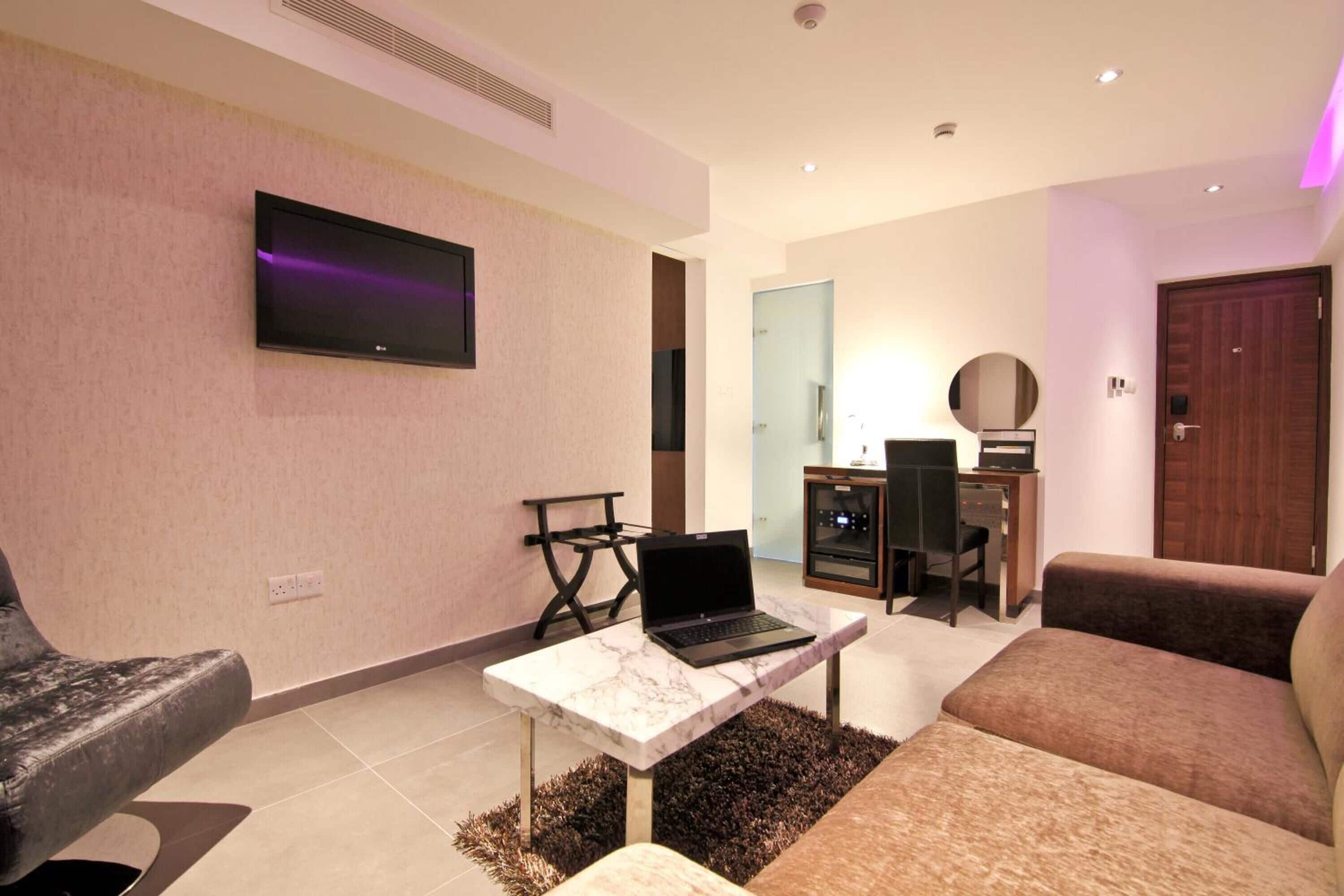 grand twin room, city view | living room | 32-inch lcd tv with satellite channels, tv