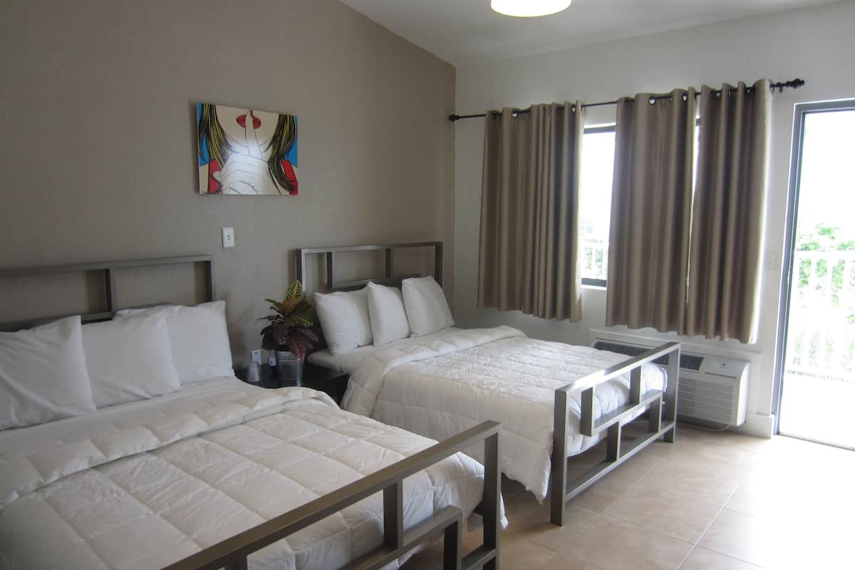 Premium bedding, pillow-top beds, blackout curtains
