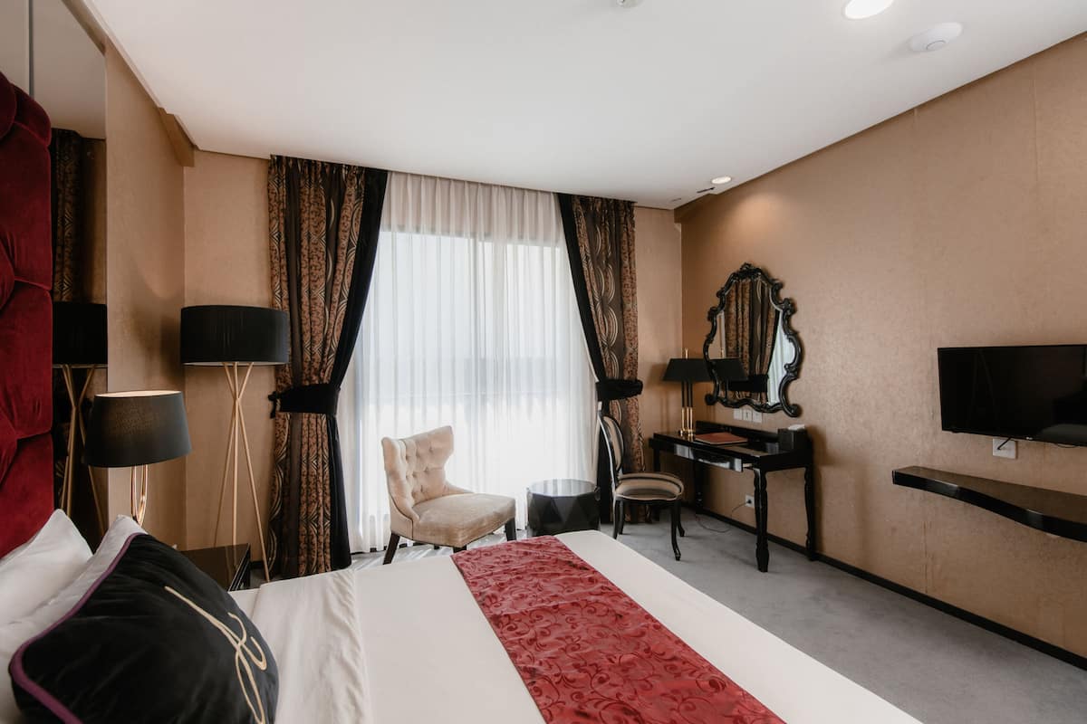 Chambre Deluxe, 1 très grand lit