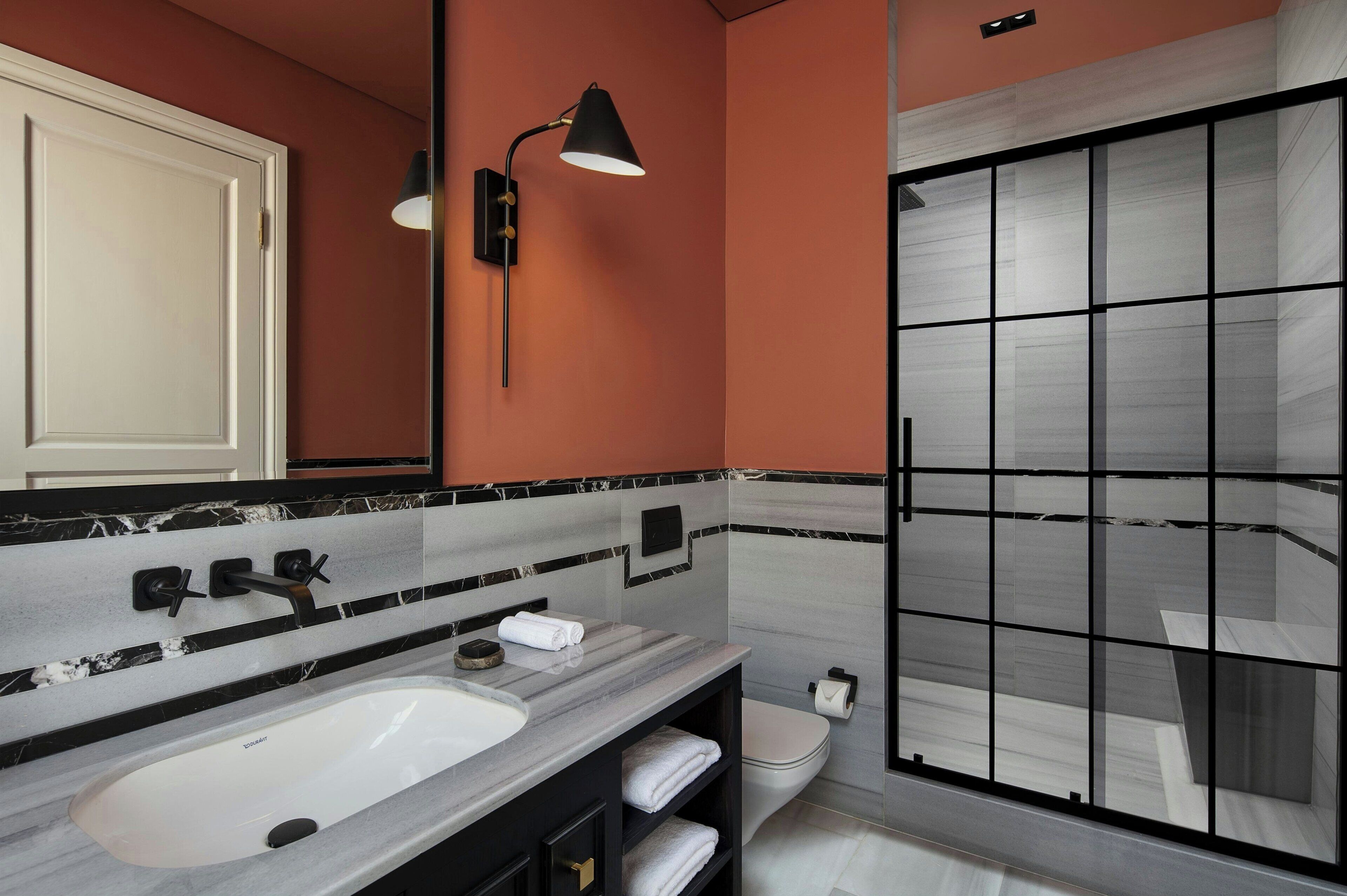 deluxe room, 1 king bed, non smoking | bathroom | eco-friendly toiletries, hair dryer, bathrobes, slippers