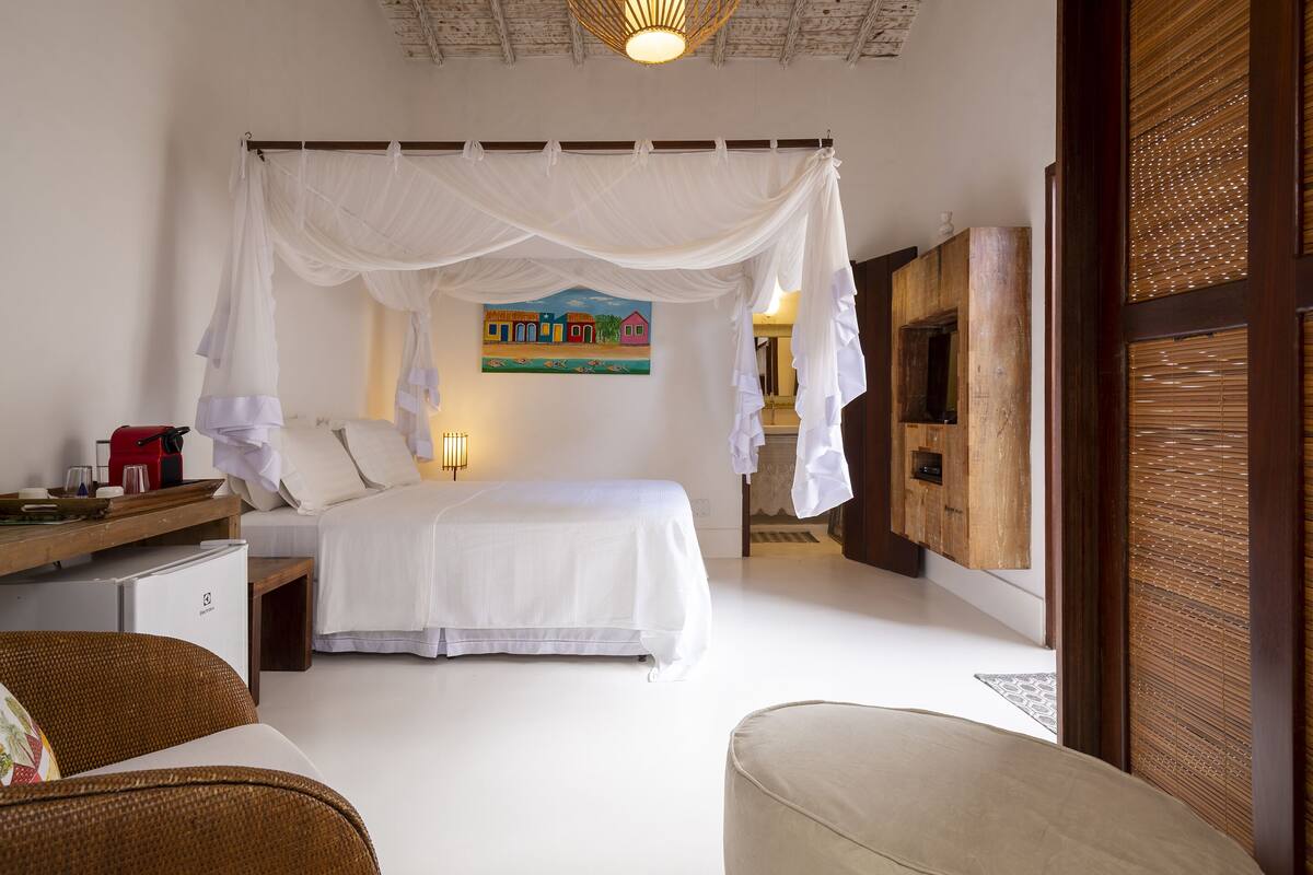 Suite estándar | Ropa de cama de alta calidad, colchones viscoelásticos, minibar