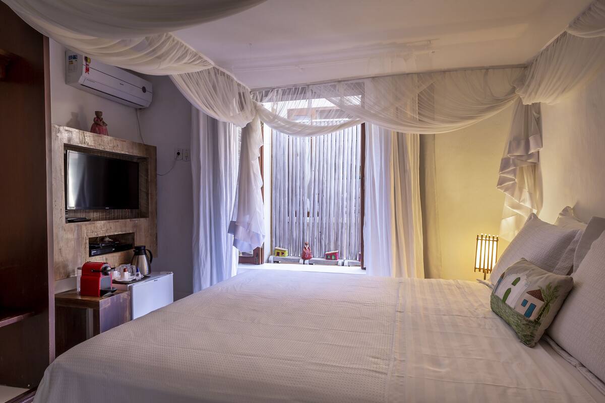 Suite económica | Ropa de cama de alta calidad, colchones viscoelásticos, minibar