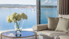 Executive Apartment, 2 Bedrooms, Sea View | Living area | 61-cm TV with satellite channels
