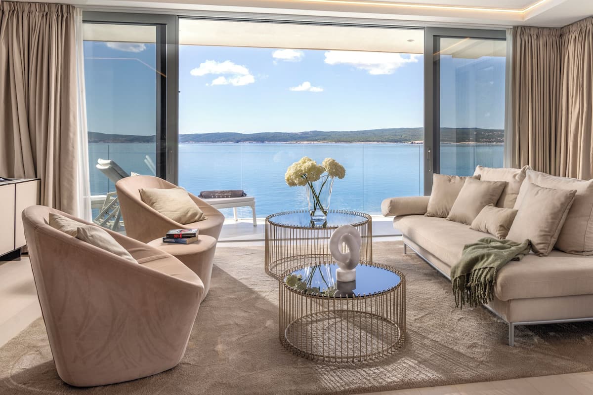 Executive Apartment, 2 Bedrooms, Sea View | Living area | 61-cm TV with satellite channels
