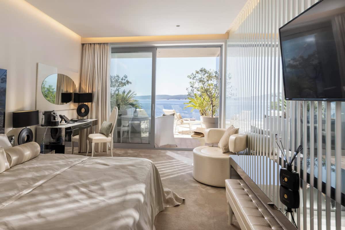 Deluxe Double Room, Terrace, Sea View | Premium bedding, minibar, in-room safe, desk