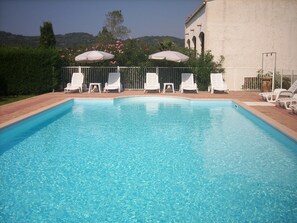 Seasonal outdoor pool, pool umbrellas, sun loungers