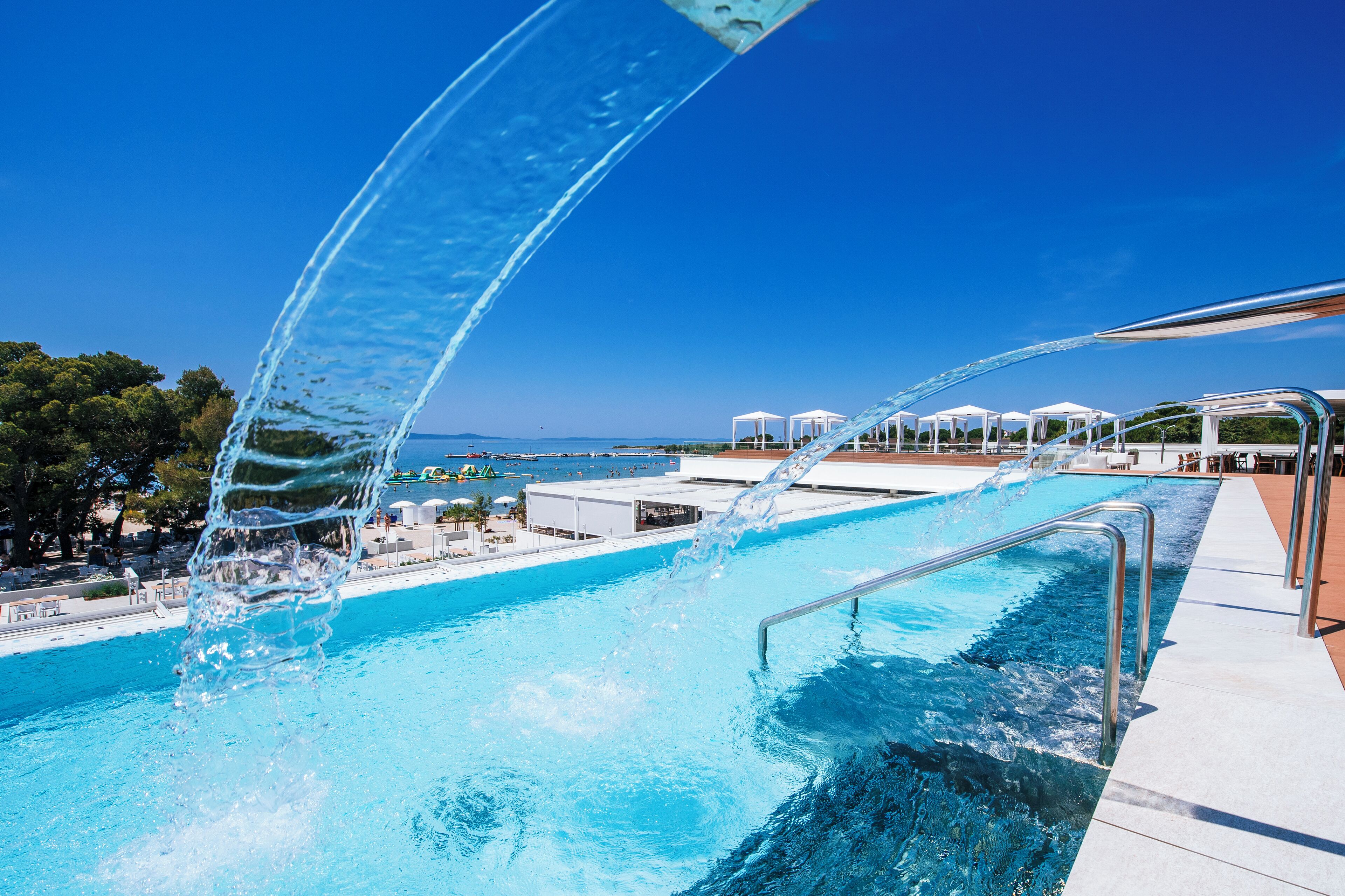 9 outdoor pools, pool umbrellas, pool loungers