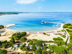 Private beach, sun loungers, beach umbrellas, beach massages