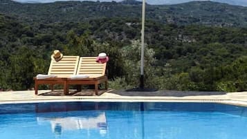 Outdoor pool, pool umbrellas, sun loungers