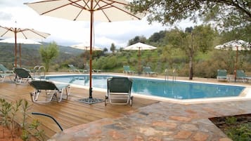 Outdoor pool, pool umbrellas, sun loungers