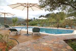 Outdoor pool, pool umbrellas, sun loungers
