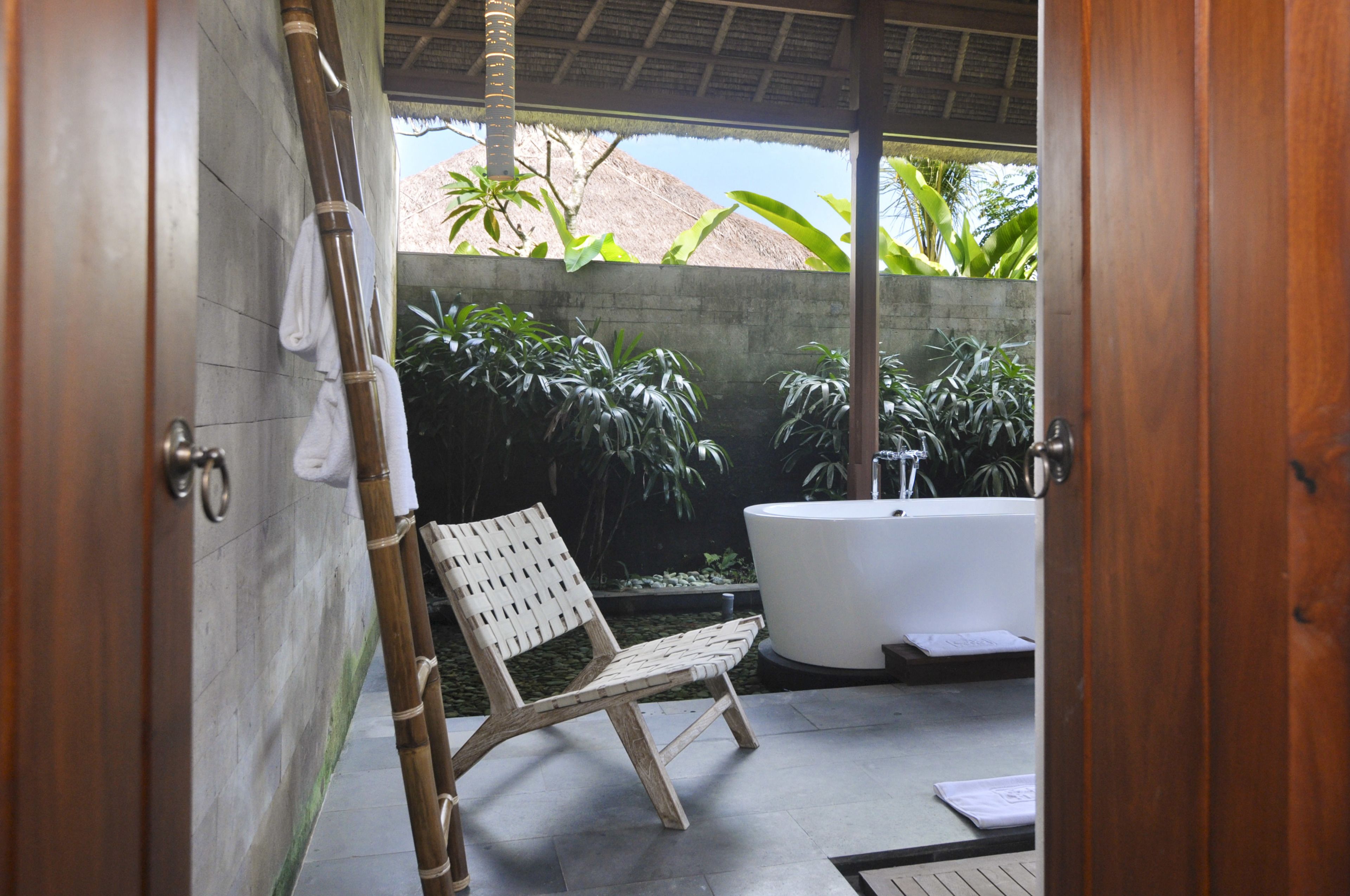 deluxe suite (double bed) | bathroom | separate bathtub and shower, rainfall showerhead, free toiletries