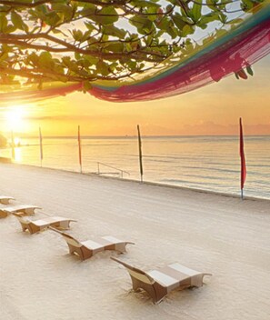 Beach nearby, white sand, sun loungers, beach umbrellas