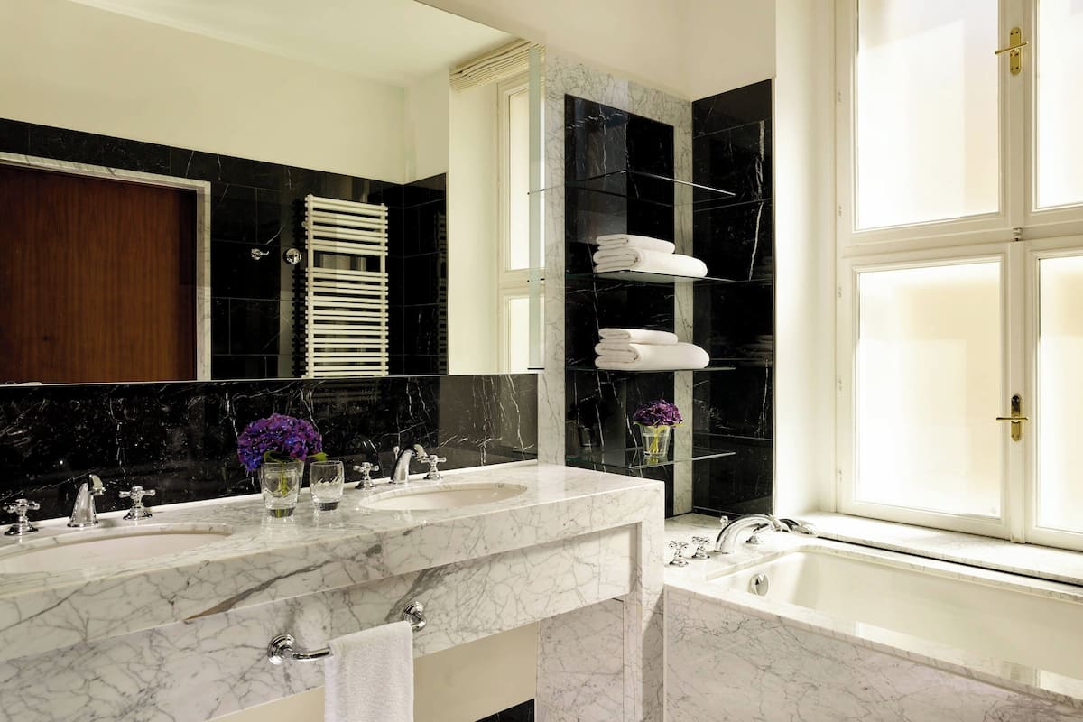 signature suite, 2 bedrooms | bathroom | separate bathtub and shower, rainfall showerhead, free toiletries