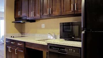Studio, 1 King Bed, Accessible (Mobility & Hearing, Roll-in Shower) | Private kitchen | Full-size fridge, microwave, stovetop, dishwasher