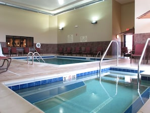 Indoor pool, open 7 AM to 11 PM, sun loungers