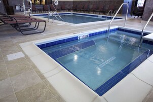 Indoor pool, open 7 AM to 11 PM, sun loungers