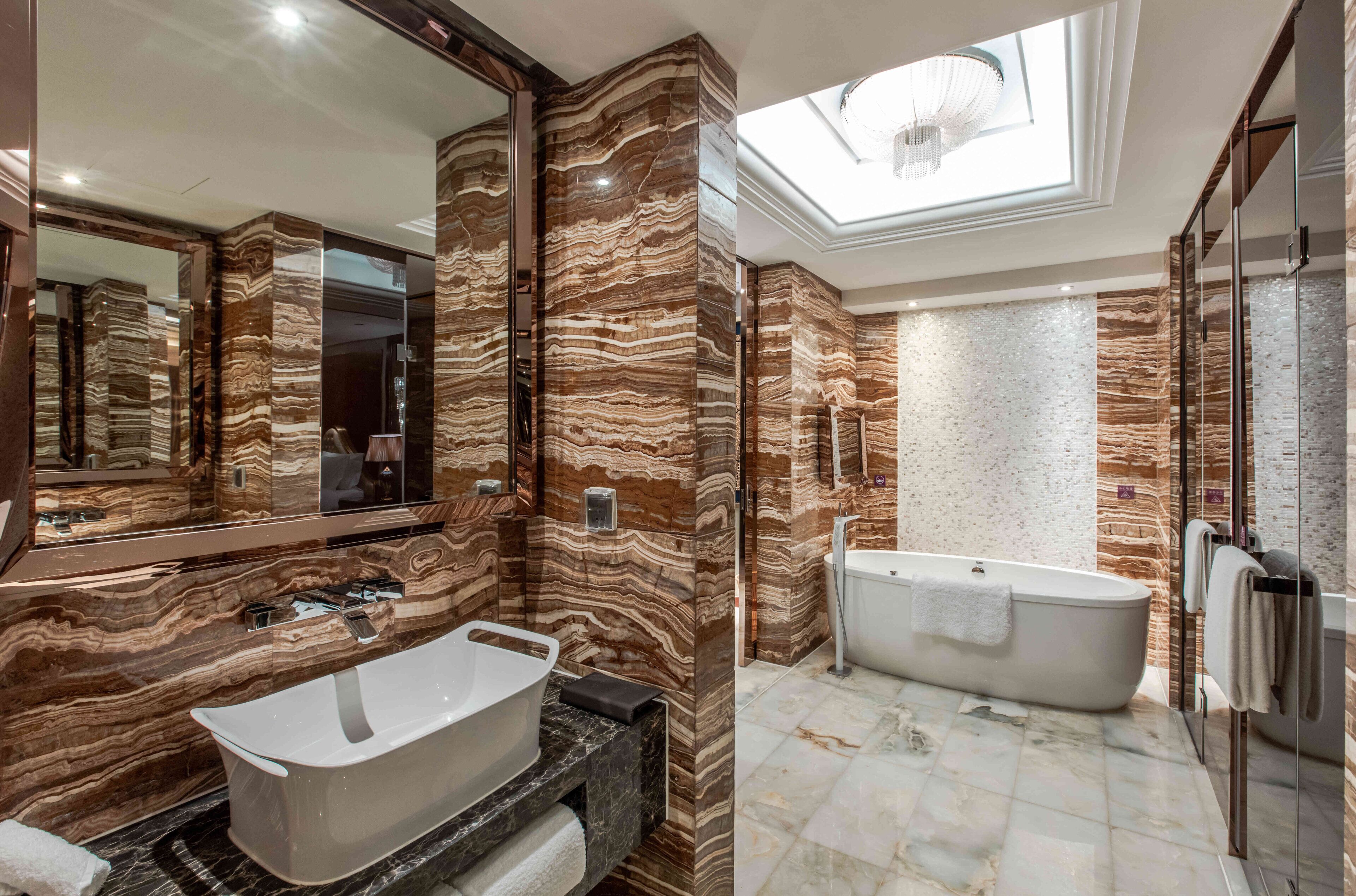 presidential suite, multiple beds | bathroom | rainfall showerhead, free toiletries, hair dryer, bathrobes