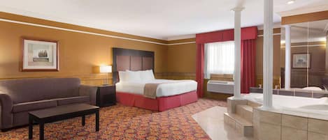 Suite, 1 kingsize bed, niet-roken, koelkast en magnetron | Een bureau, een laptopwerkplek, verduisterende gordijnen