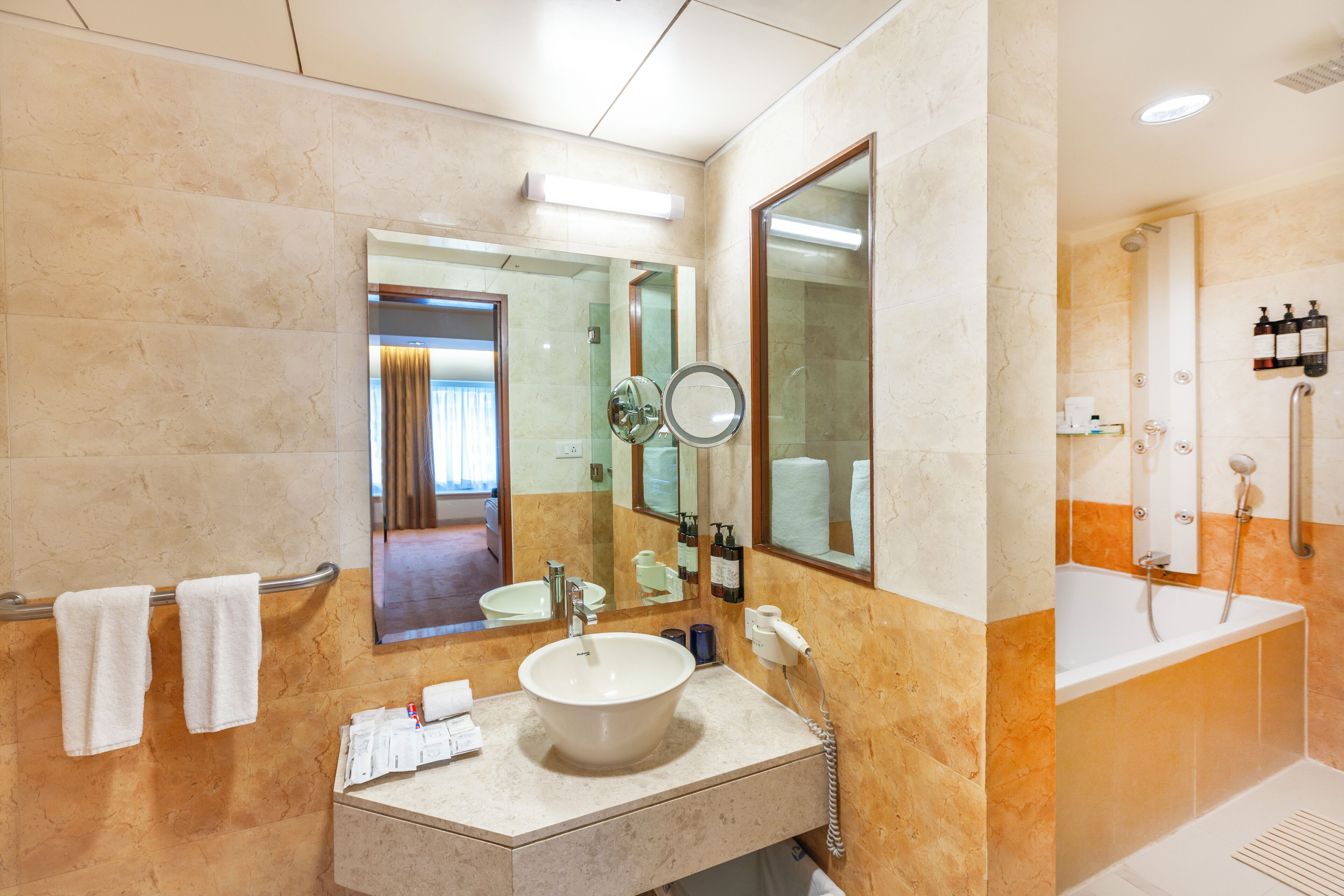 deluxe suite (deluxe suite room) | bathroom | shower, rainfall showerhead, free toiletries, hair dryer