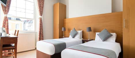 Premium bedding, Select Comfort beds, blackout curtains, free WiFi