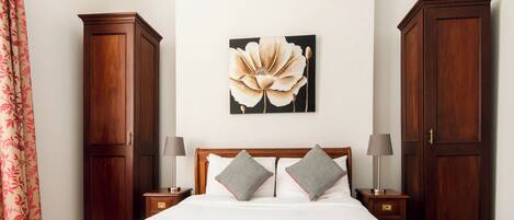 Premium bedding, Select Comfort beds, blackout drapes, free WiFi