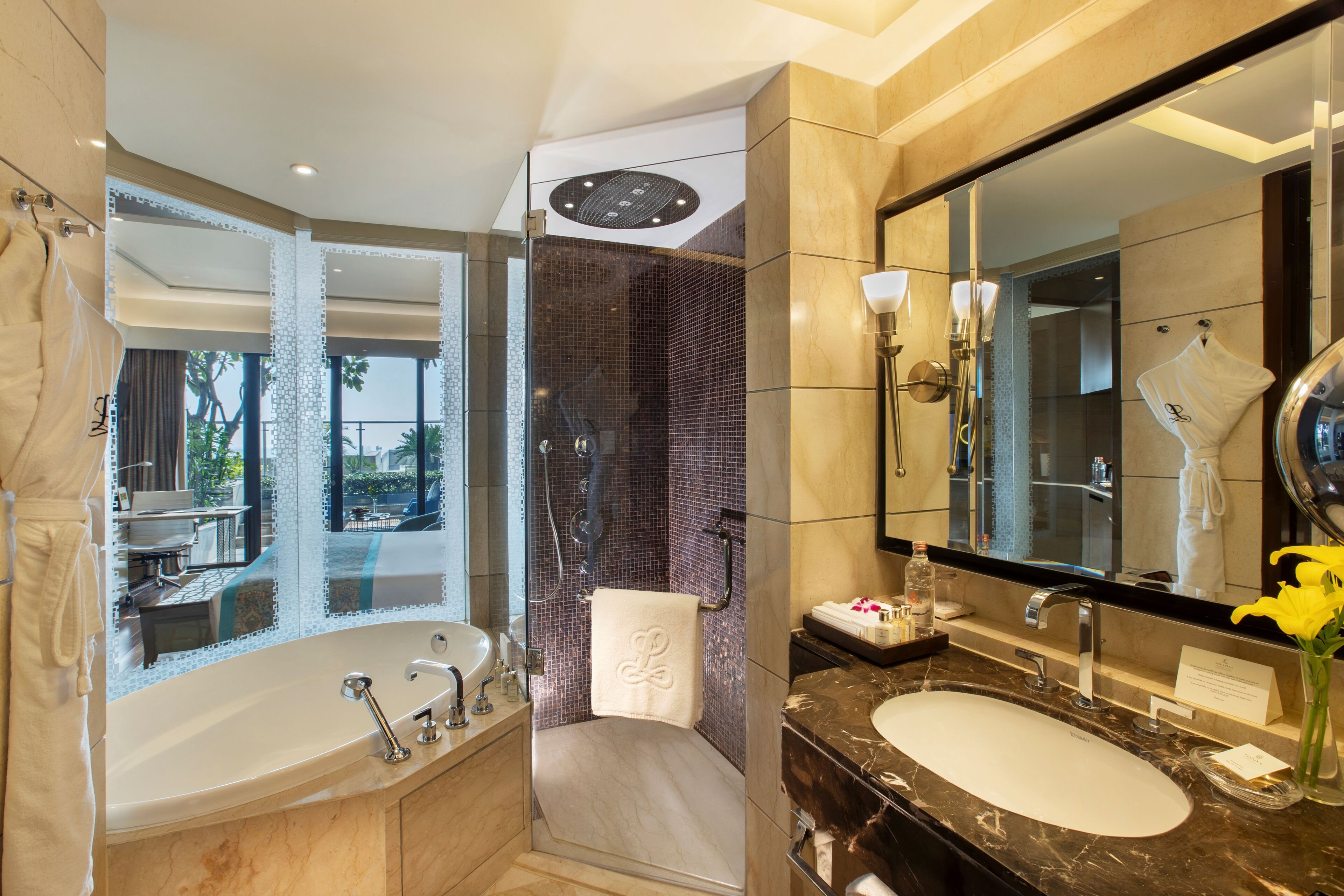 separate bathtub and shower, deep-soaking bathtub, designer toiletries