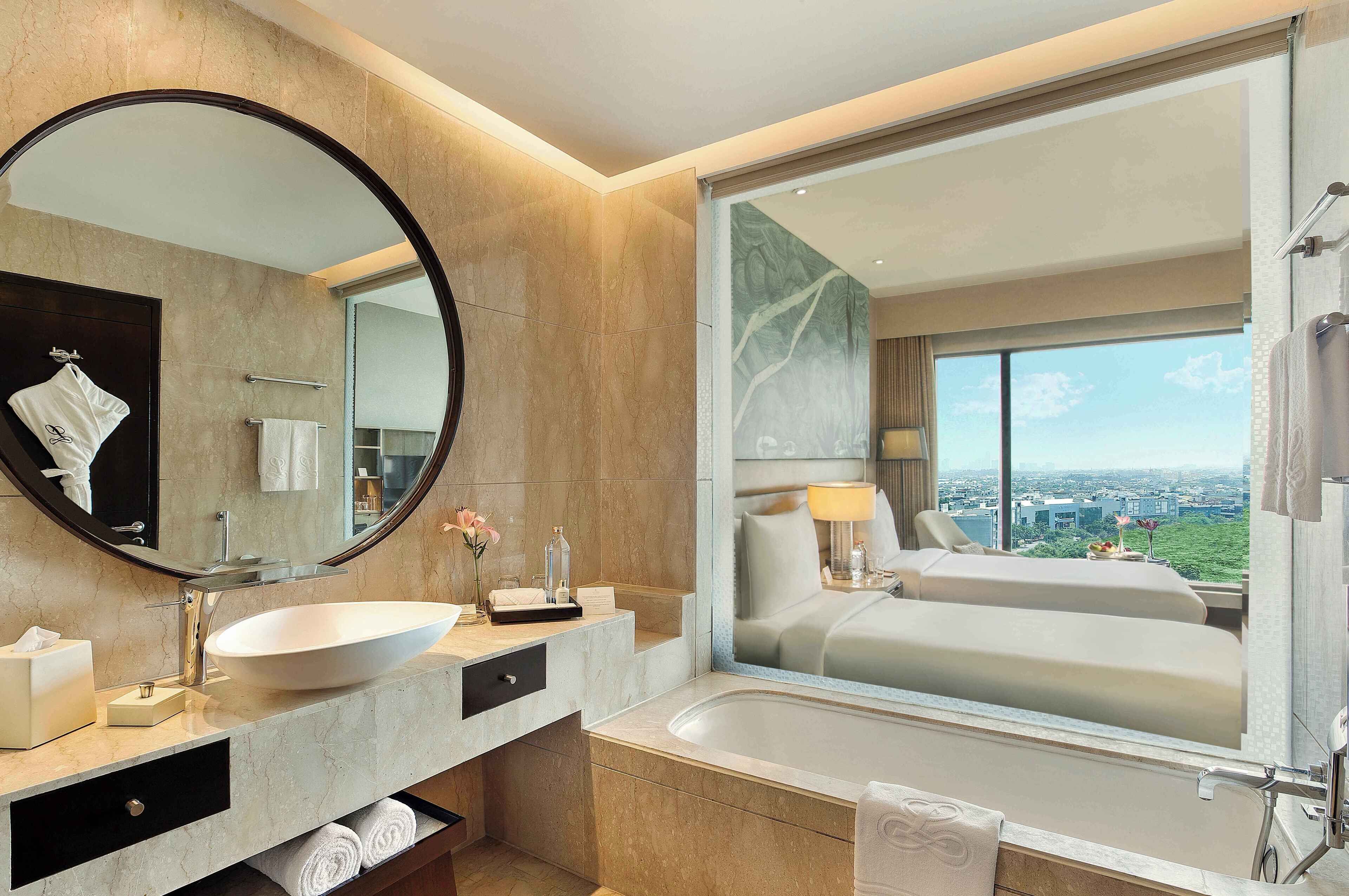 separate bathtub and shower, deep-soaking bathtub, designer toiletries