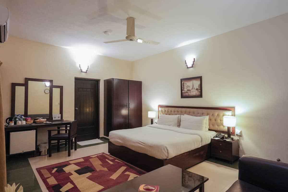 Habitación ejecutiva | Minibar, escritorio, cortinas blackout y insonorización