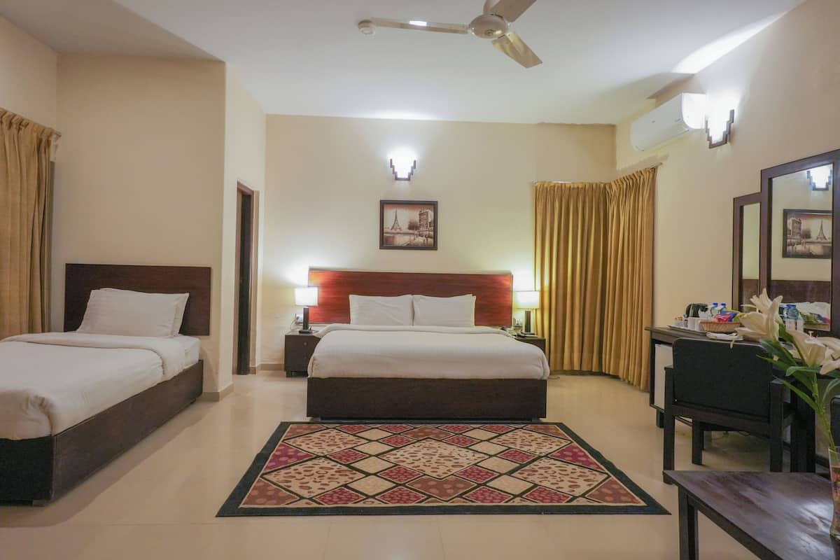 Habitación Deluxe con 2 camas individuales | Minibar, escritorio, cortinas blackout y insonorización