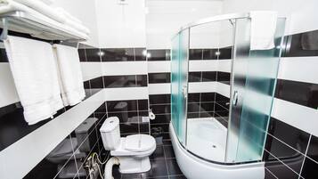 Family Room, 2 Bedrooms | Bathroom | Shower, free toiletries, hair dryer, slippers