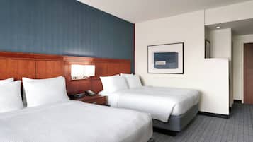 Premium bedding, desk, laptop workspace, iron/ironing board
