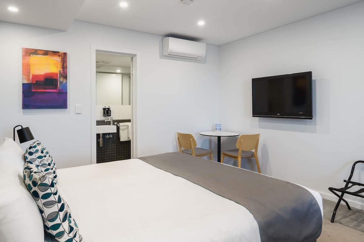 Standard Room, Multiple Beds | Minibar, desk, laptop workspace, iron/ironing board