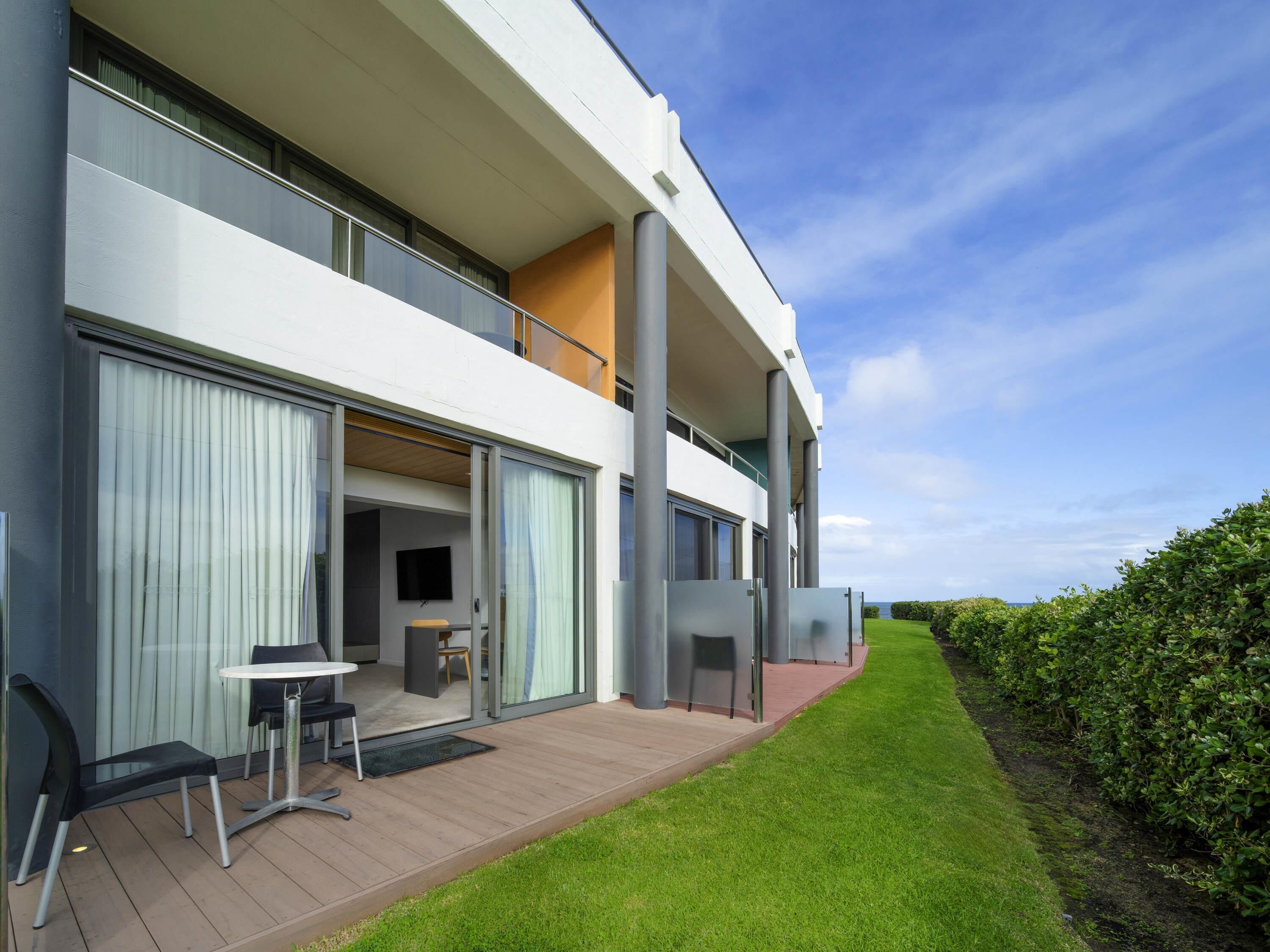 Minibar, desk, laptop workspace, iron/ironing board