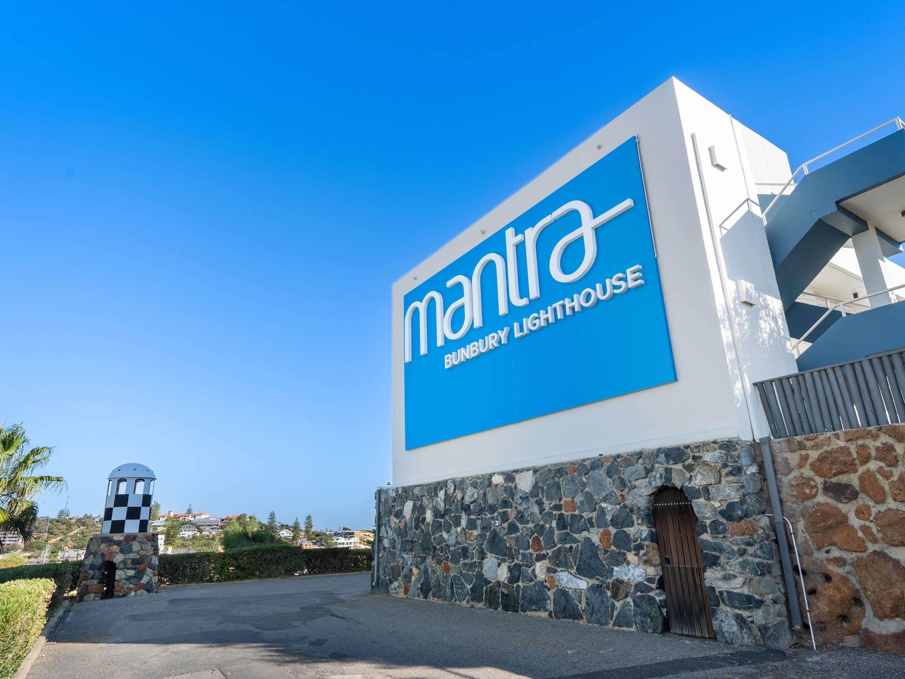 A building with a sign reading 'mantra SUNBURY LIGHTHOUSE.'