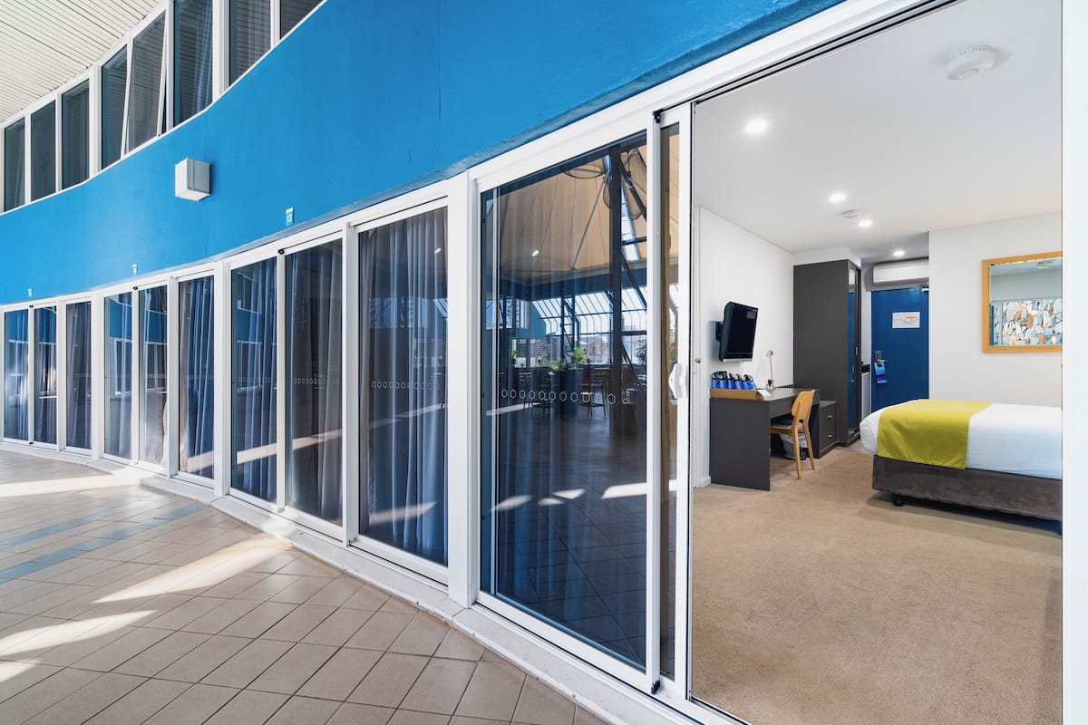 Standard Room, 1 Queen Bed, Poolside | Minibar, desk, laptop workspace, iron/ironing board